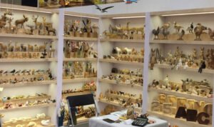 Branded wood carving gifts on store shelf